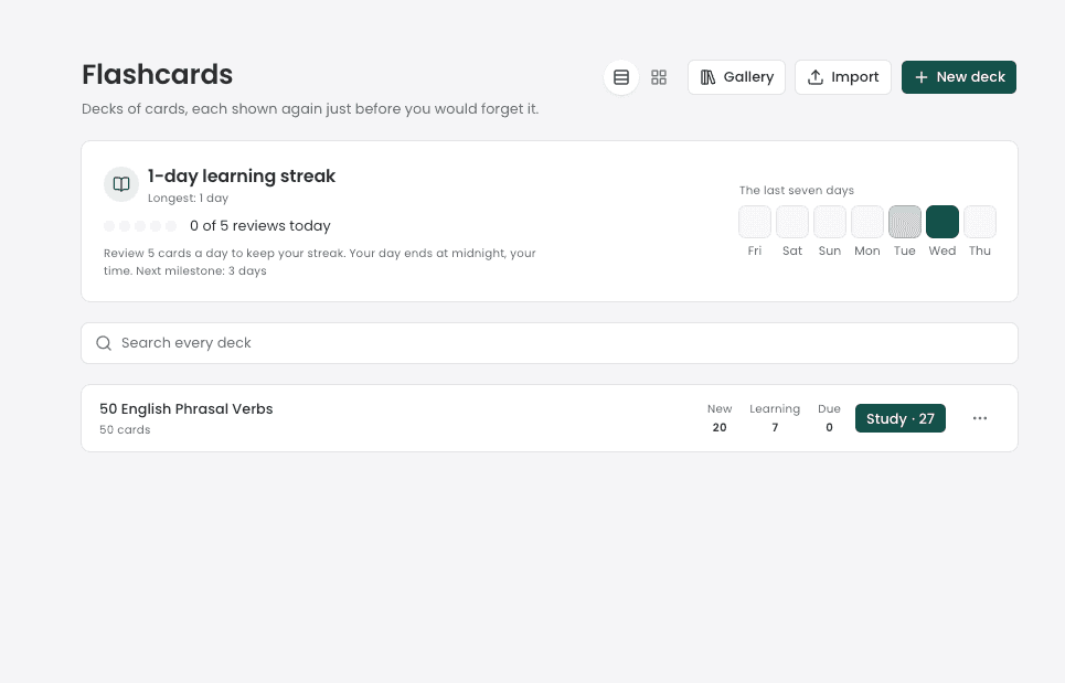 FocusCrew's Flashcards page with a 1-day learning streak and the 50 English Phrasal Verbs deck